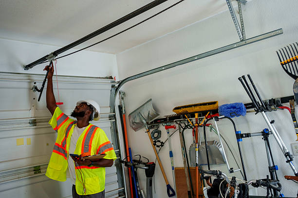 Professional Garage Door Panel Replacement technician working in Indianola, IA